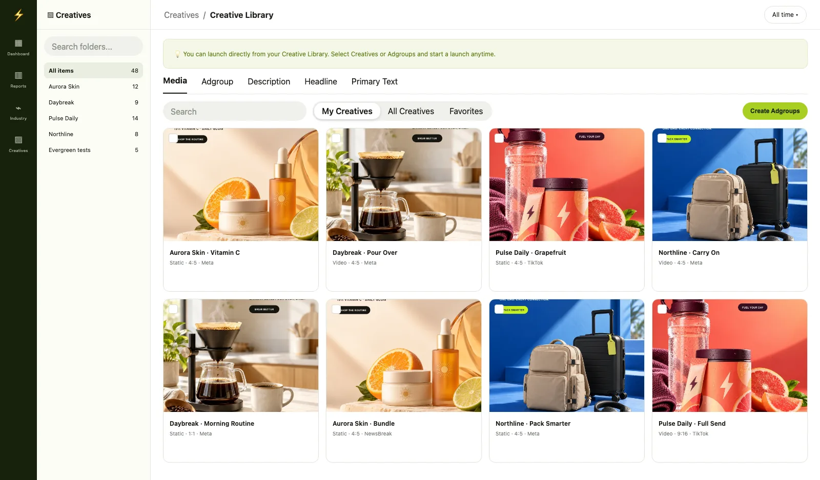 Creative Library folder view with campaign folders, the launch banner, Media and Adgroup tabs, and a grid of ad creatives